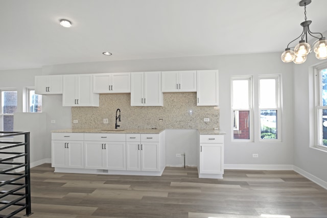 kitchen with sink and white cabinetry