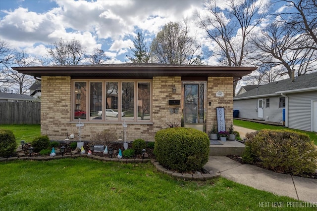 view of front of home with a front yard