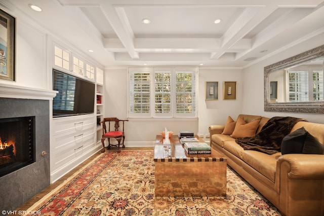 living room featuring coffered ceiling, beam ceiling, and a wealth of natural light