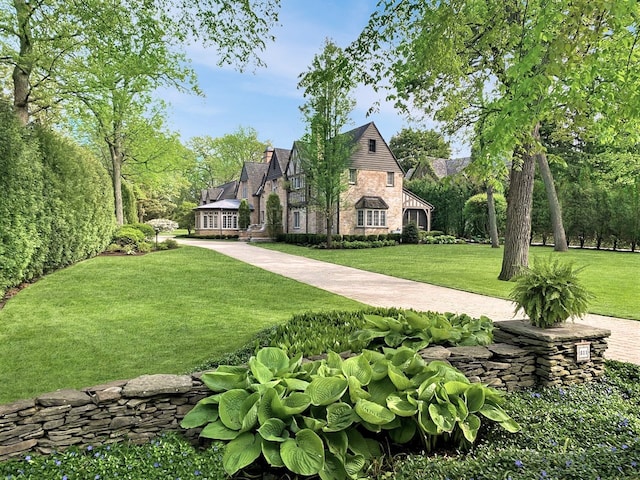 view of front facade with a front lawn