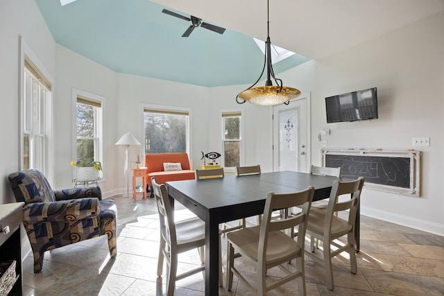 dining room featuring ceiling fan