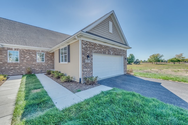 view of property exterior with a garage