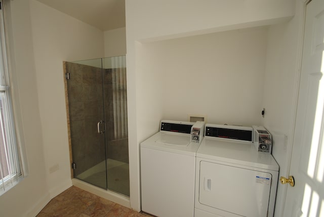 laundry area with separate washer and dryer