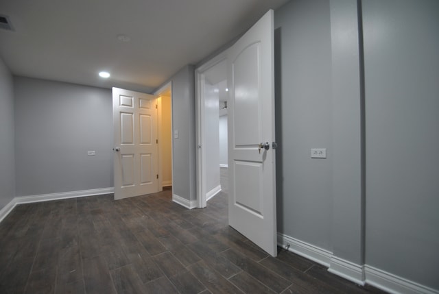 interior space with dark hardwood / wood-style floors