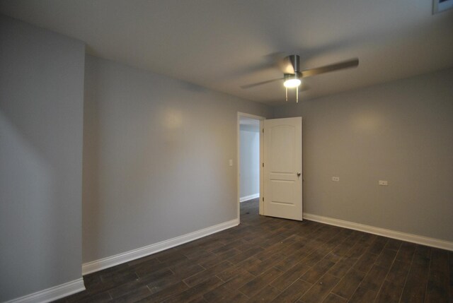 2701 W Congress Pkwy, Chicago, IL 60612 - empty room with a ceiling fan and dark wood-type flooring