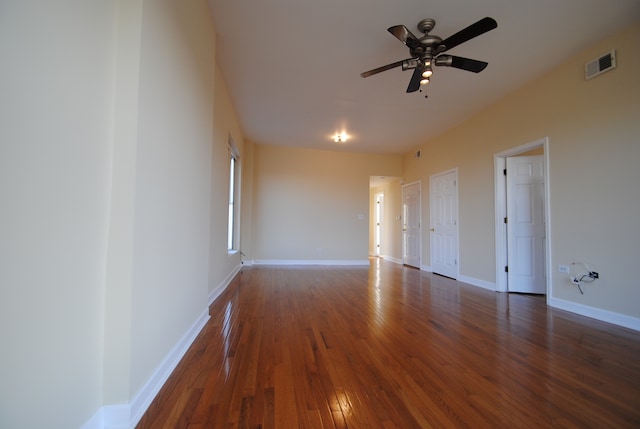 interior space featuring ceiling fan and dark hardwood / wood-style floors