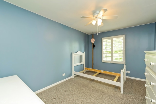 bedroom featuring ceiling fan and carpet floors