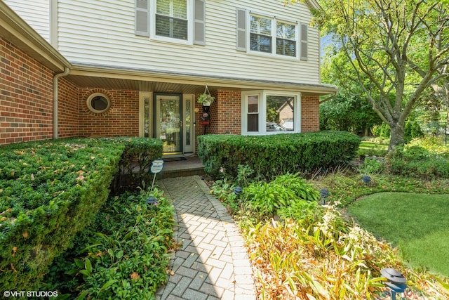 entrance to property with a porch