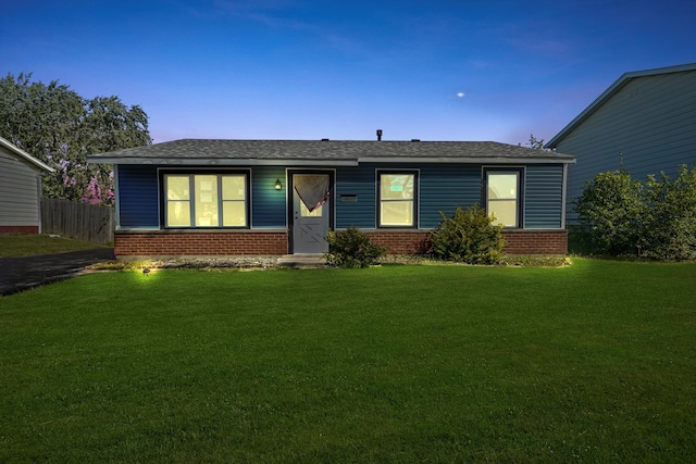 view of front facade featuring a yard