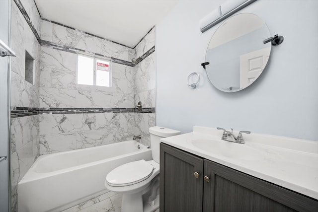 full bathroom with vanity, toilet, and tiled shower / bath