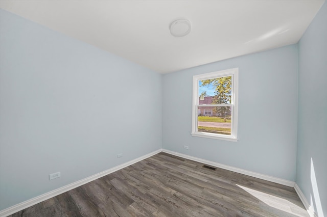 empty room with wood-type flooring