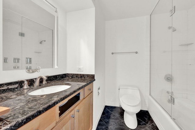 full bathroom featuring tile patterned flooring, toilet, combined bath / shower with glass door, and vanity