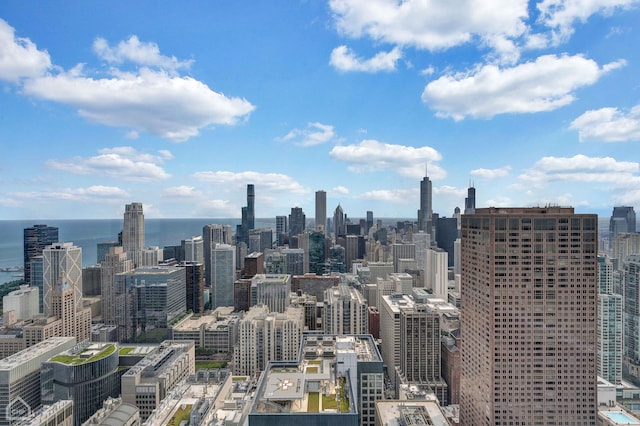 property's view of city with a water view