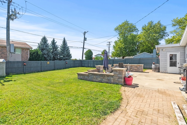 view of yard featuring a patio area and a fenced backyard