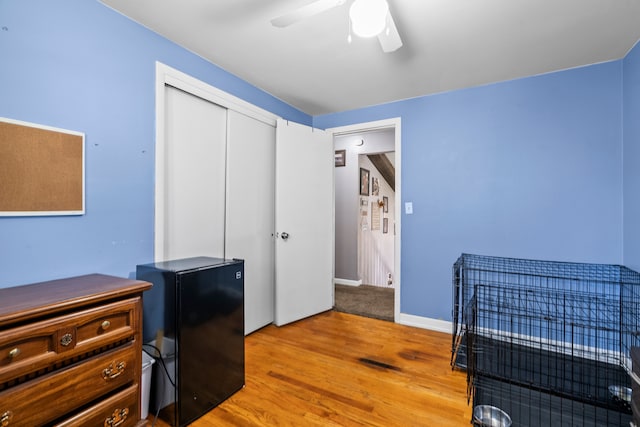 interior space featuring light wood-type flooring and ceiling fan