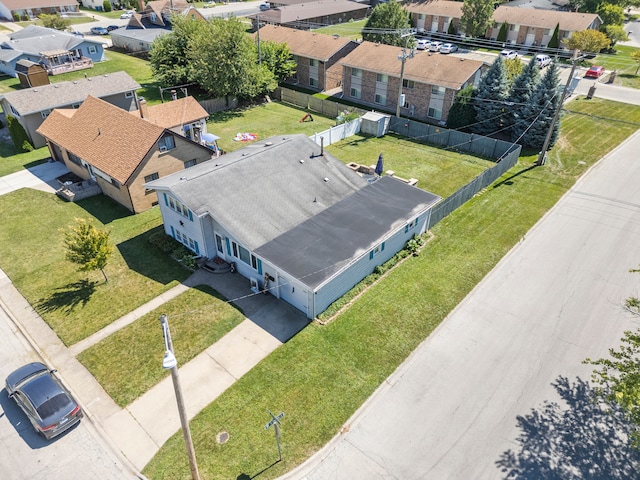 birds eye view of property with a residential view