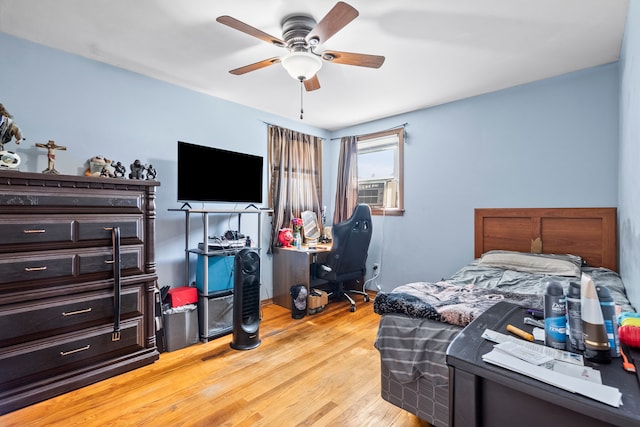 bedroom featuring ceiling fan and light wood-type flooring