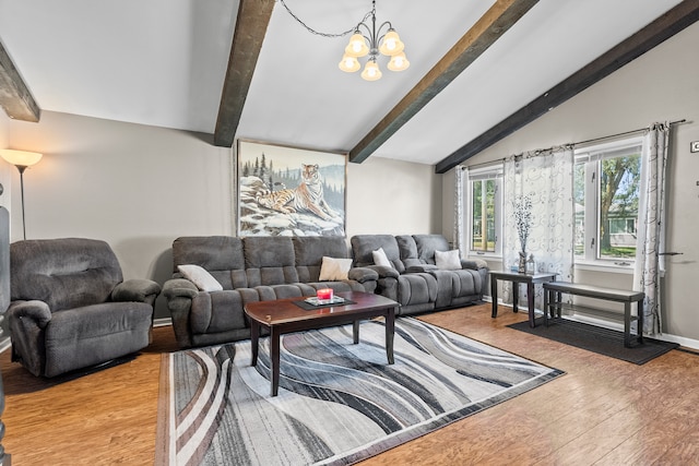 living room featuring a notable chandelier, hardwood / wood-style floors, and vaulted ceiling with beams