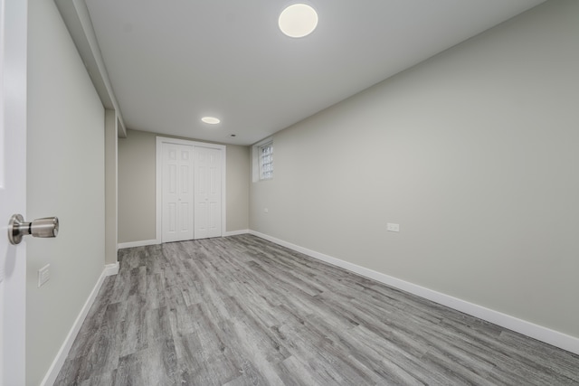 spare room featuring light hardwood / wood-style floors