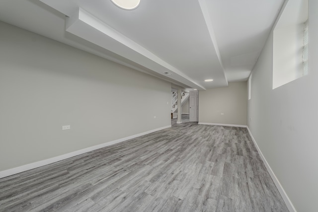 basement with light wood-type flooring