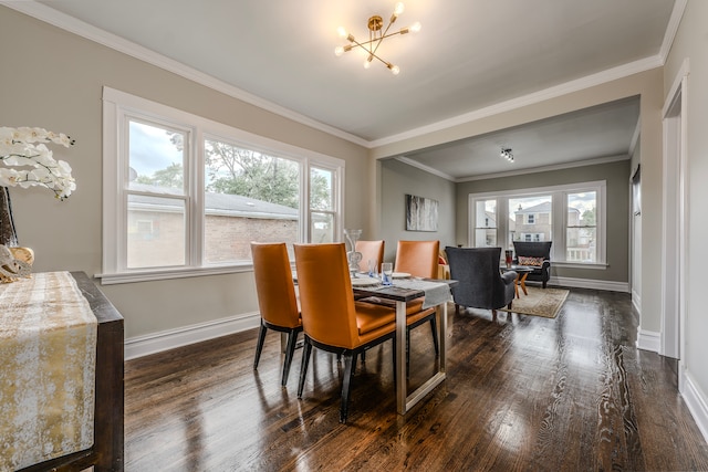 dining room with dark hardwood / wood-style flooring, a notable chandelier, and ornamental molding