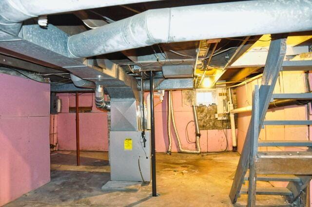 unfinished basement with heating unit
