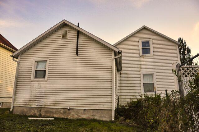 view of property exterior at dusk