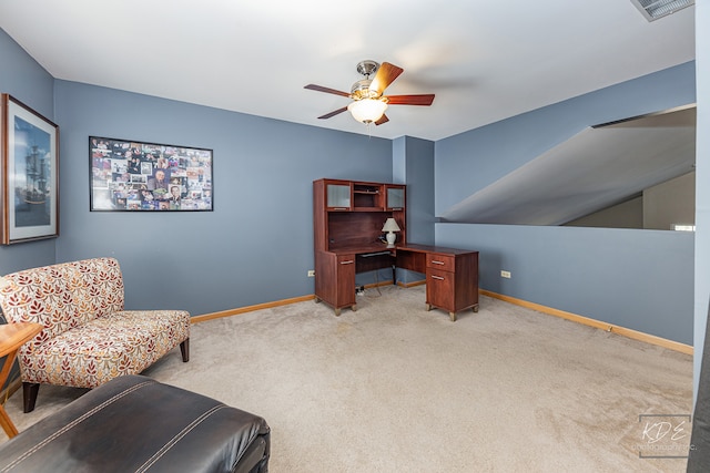 sitting room featuring light carpet and ceiling fan