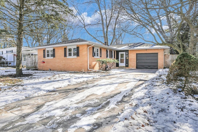 ranch-style home with a garage