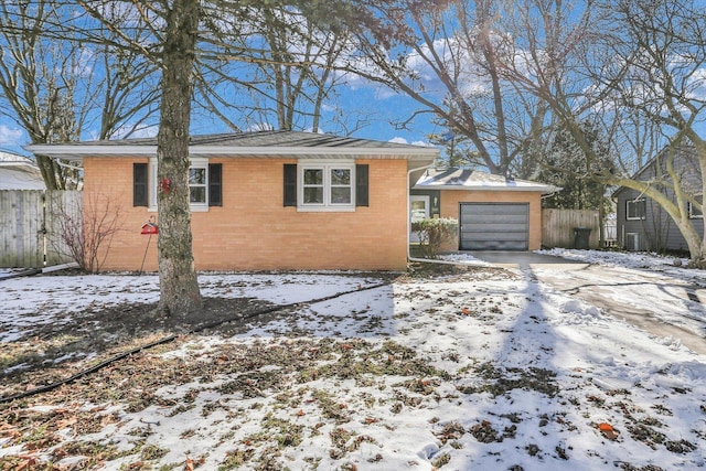 single story home featuring a garage