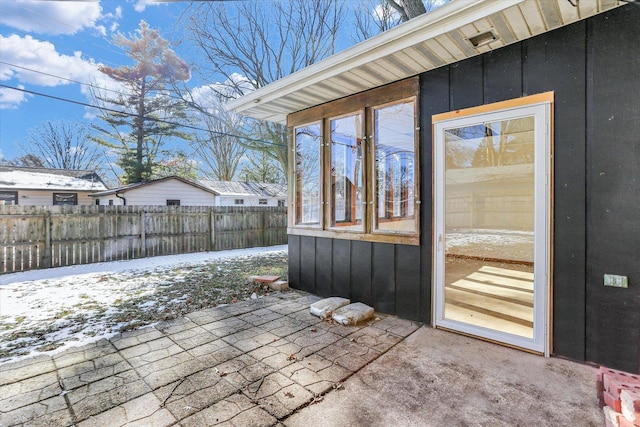 view of snow covered patio