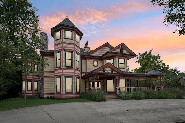 victorian-style house with covered porch