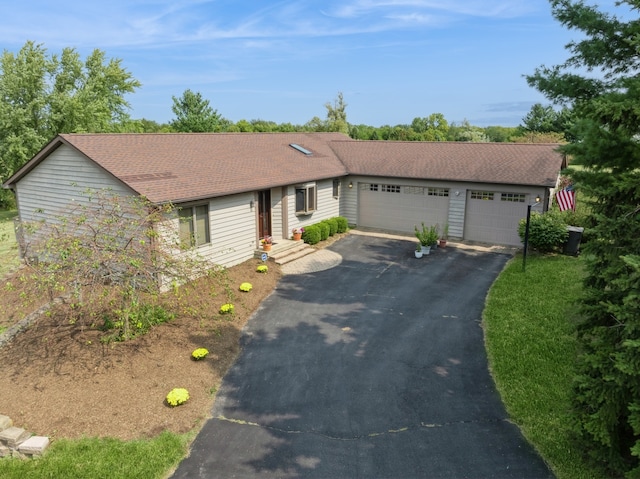 single story home with a garage