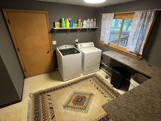 washroom with washer and clothes dryer