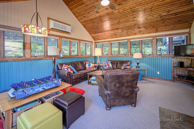 living room featuring carpet, wood ceiling, lofted ceiling, ceiling fan, and wooden walls