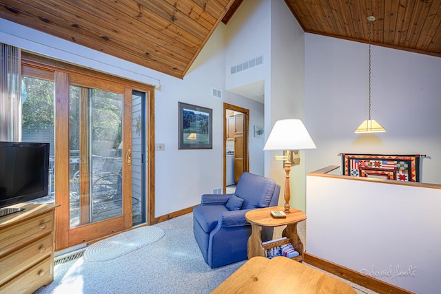 sitting room featuring wooden ceiling, carpet, visible vents, and baseboards