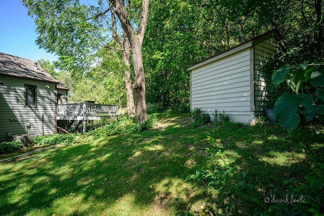 view of yard with a deck