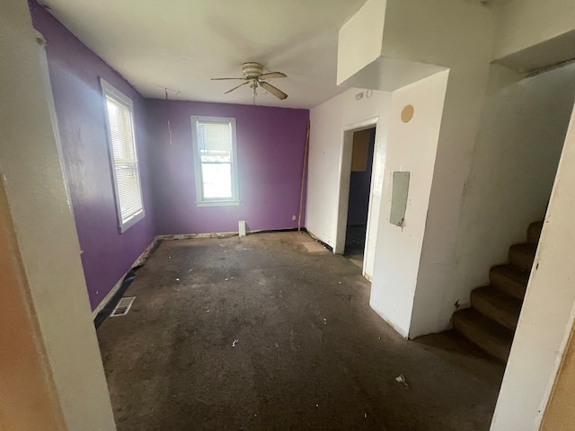 interior space featuring ceiling fan