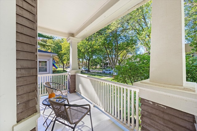 balcony featuring a porch