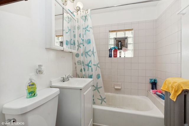 full bathroom with vanity, toilet, and shower / bath combo