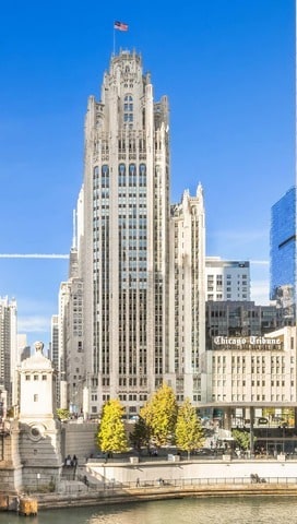 view of building exterior with a water view