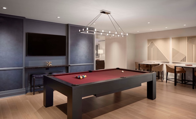 recreation room featuring pool table and light hardwood / wood-style flooring