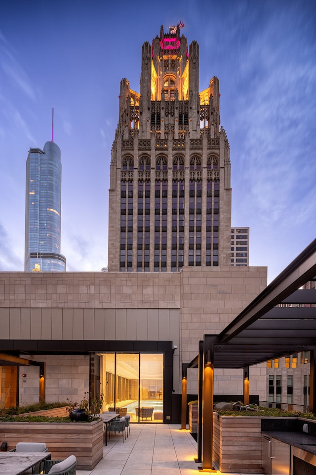 view of outdoor building at dusk