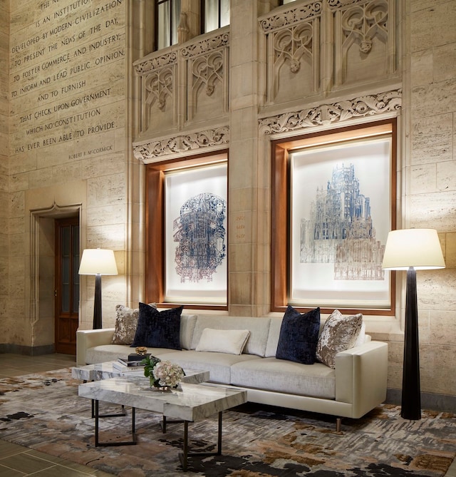 living room featuring a high ceiling