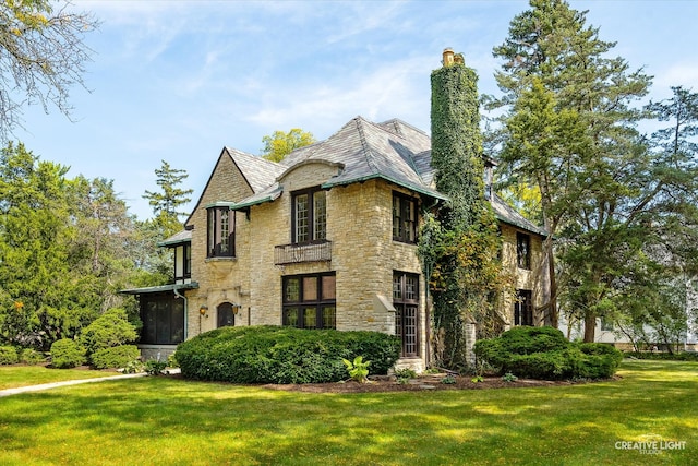 view of property exterior featuring a yard