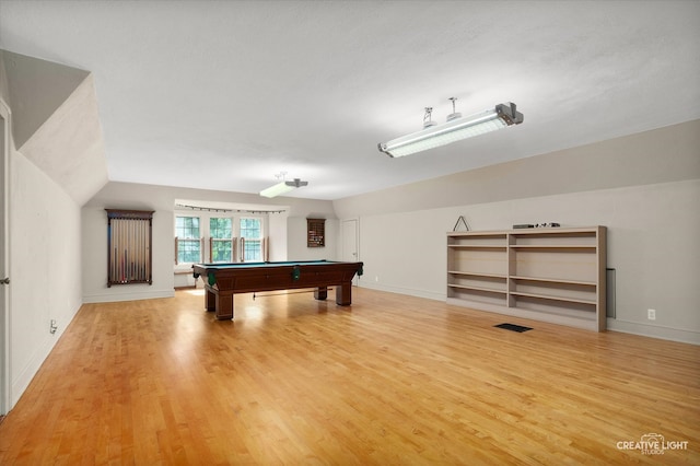 rec room with wood-type flooring, lofted ceiling, and billiards