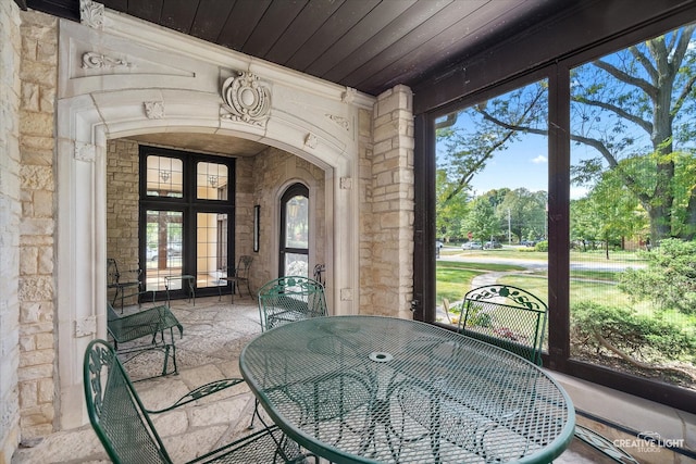 sunroom / solarium with a healthy amount of sunlight