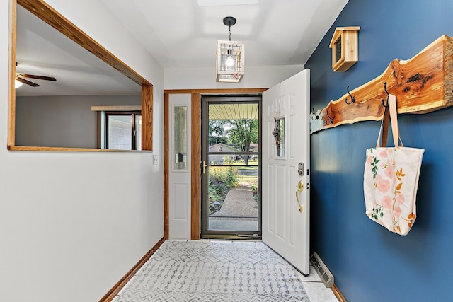 foyer with ceiling fan