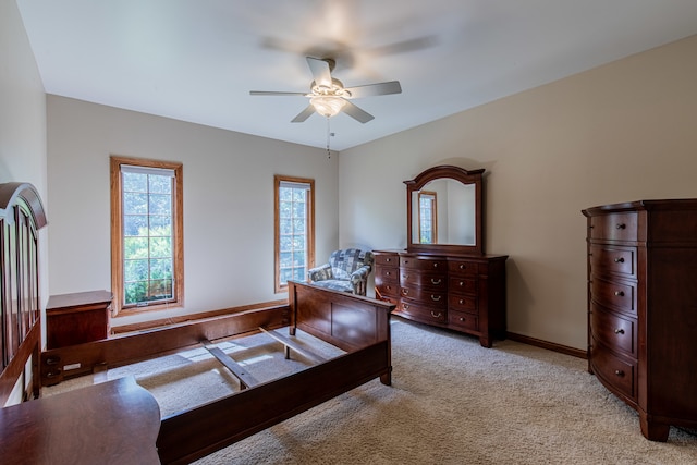 office area with light colored carpet and ceiling fan