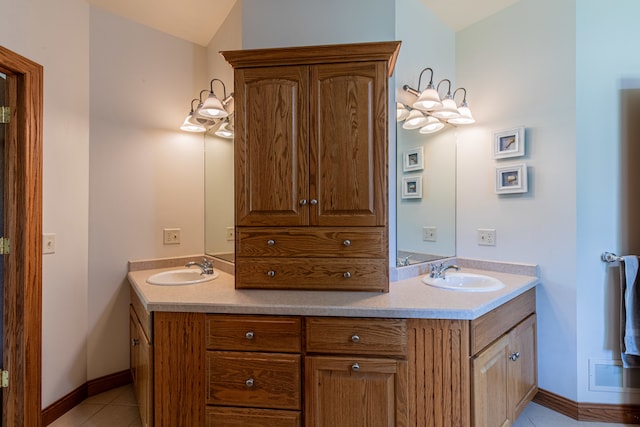 bathroom featuring tile patterned floors and vanity